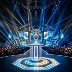 League of Legends Worlds Summoners Cup trophy and esports arena stage key art