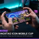 Mobile gamer holding smartphone with four-finger claw grip competing in touchscreen battle royale tournament