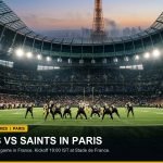 Stade de France stadium in Paris under evening floodlights hosting an American football showcase